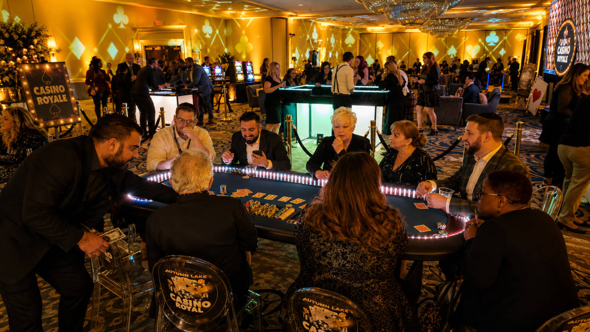 Guests playing at a Royal Entertainment casino party rental in New York City